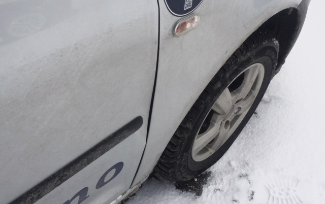 Wind damage of a rental camper door in Norway